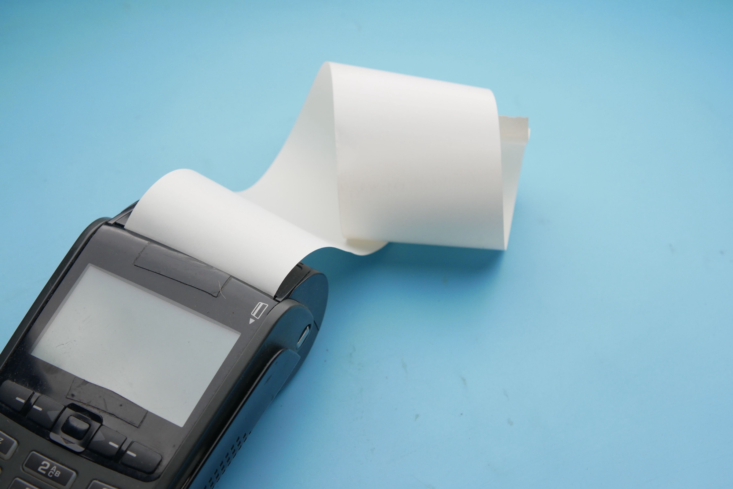 Thermal paper loaded in a point-of-sale terminal